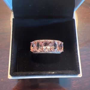 Beautiful almost new 14K rose gold Morganite and diamonds right hand ring .